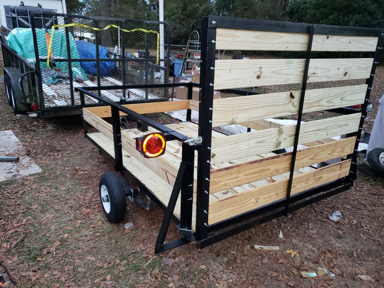 4x8  (Utility Trailer) 1000 lb capacity, lights, ramp, tongue jack, safety chain